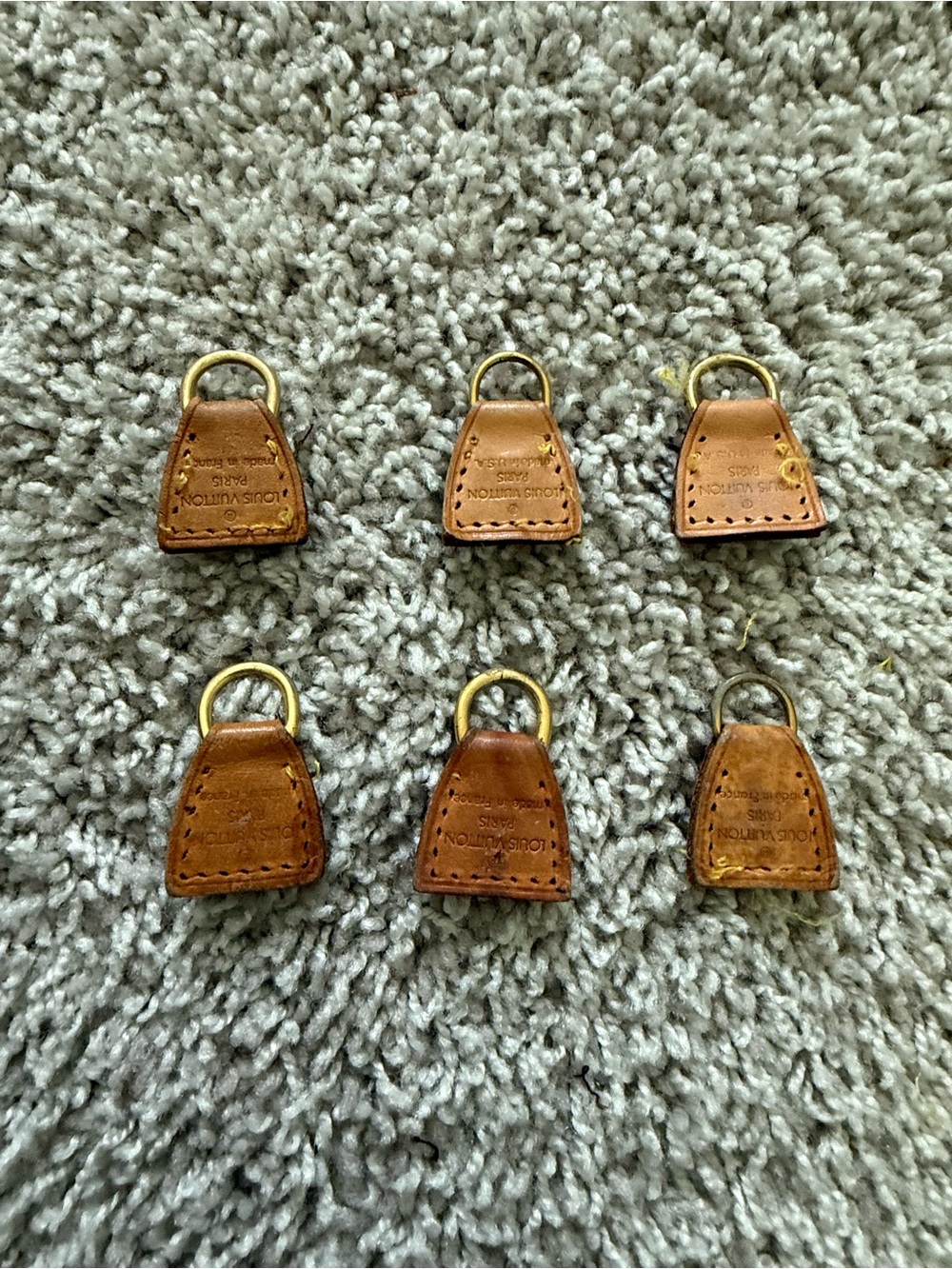 Louis Vuitton Pochette tag
